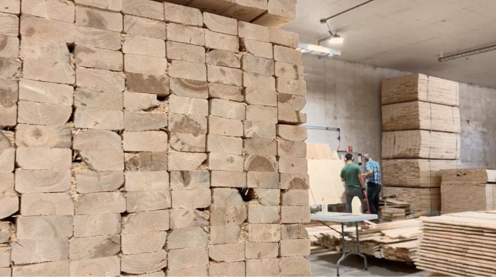 Warehouse filled with pallets, crates and specialty storage products.